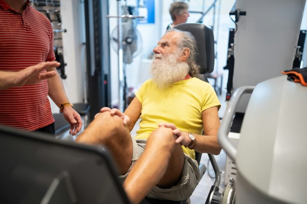 Senior man doing a gentle exercise at home